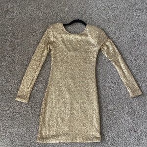 Never worn Gold sequin double lined dress